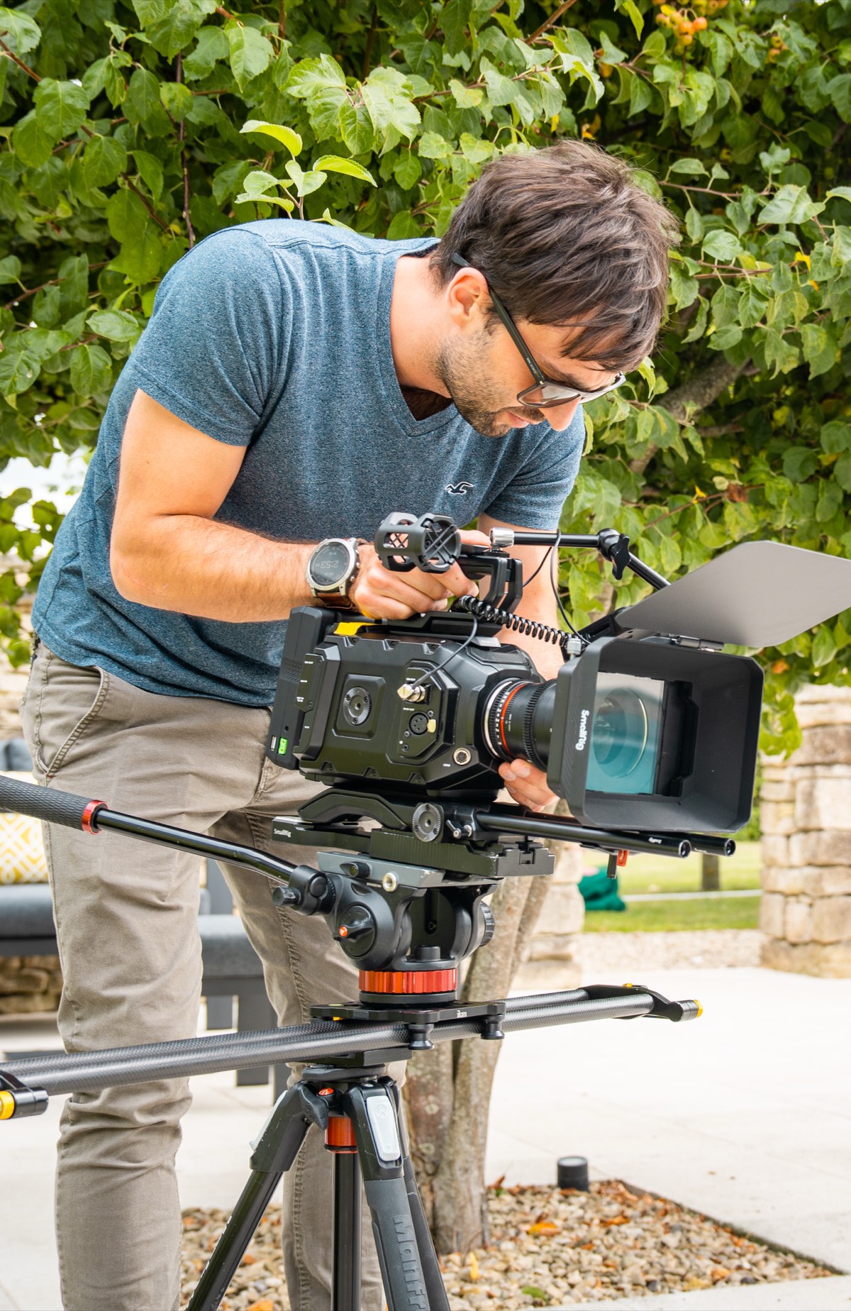 Moss Davis operating URSA 12K cinema camera on tripod outdoors